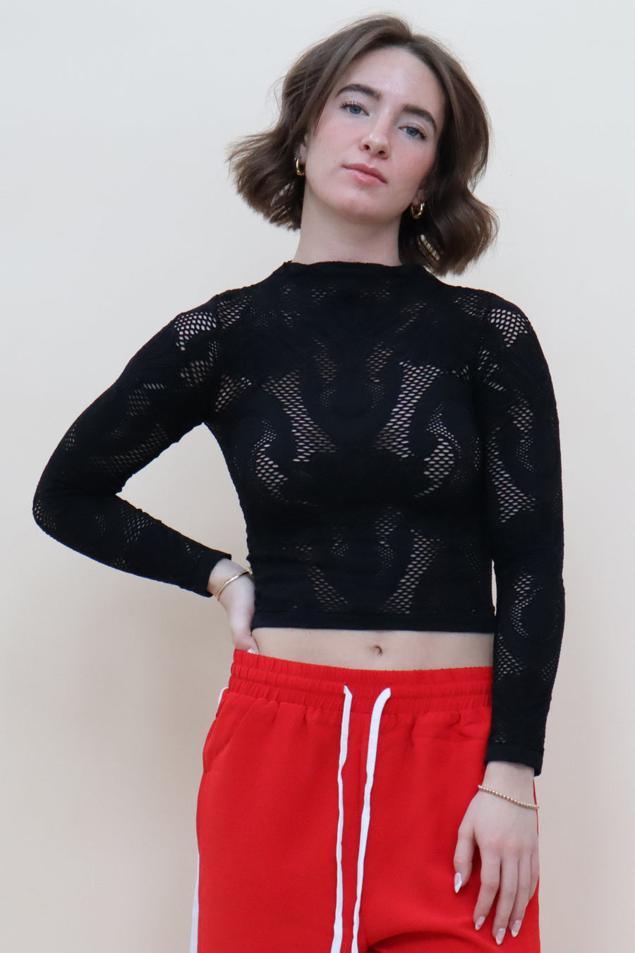 black fishnet long sleeve with unique mesh design